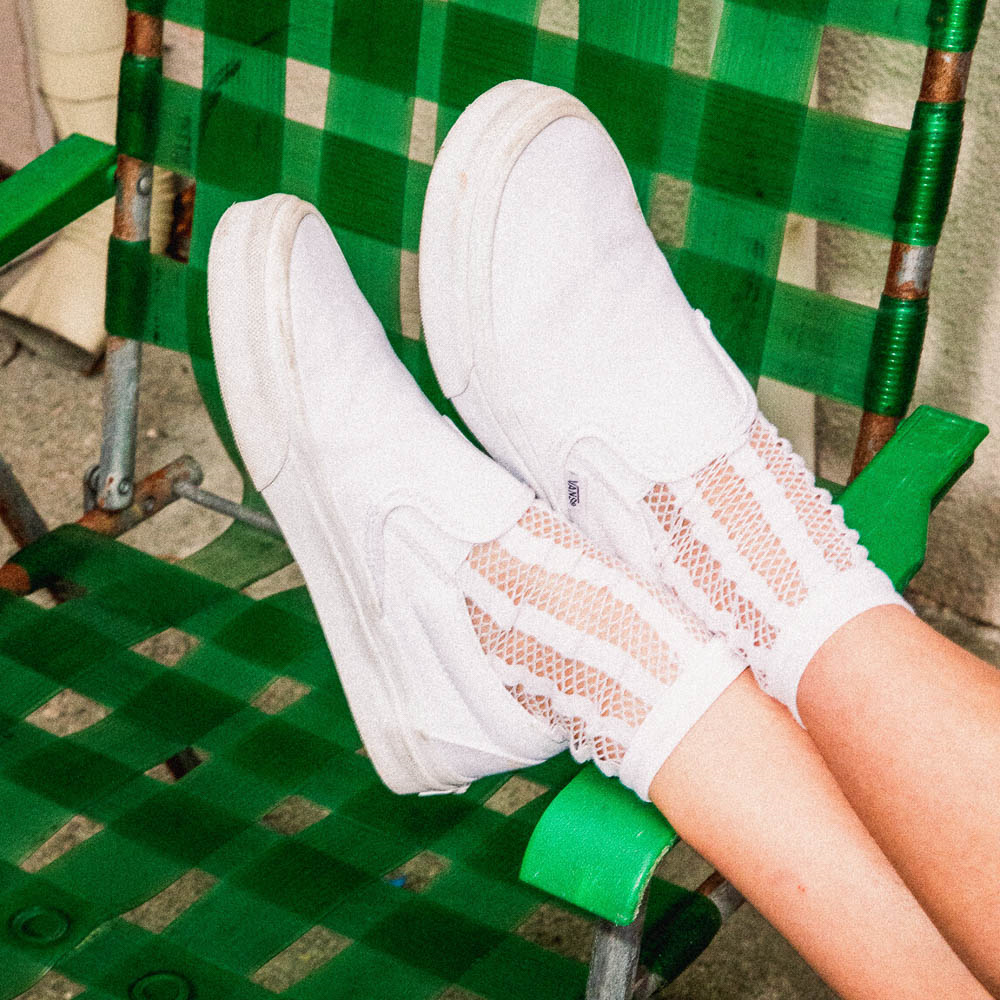 All white slip on vans journeys online