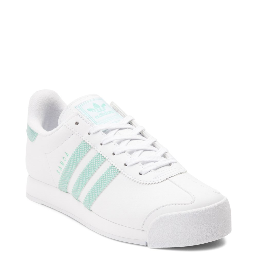 womans white adidas trainers