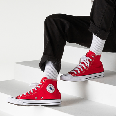 red converse on feet