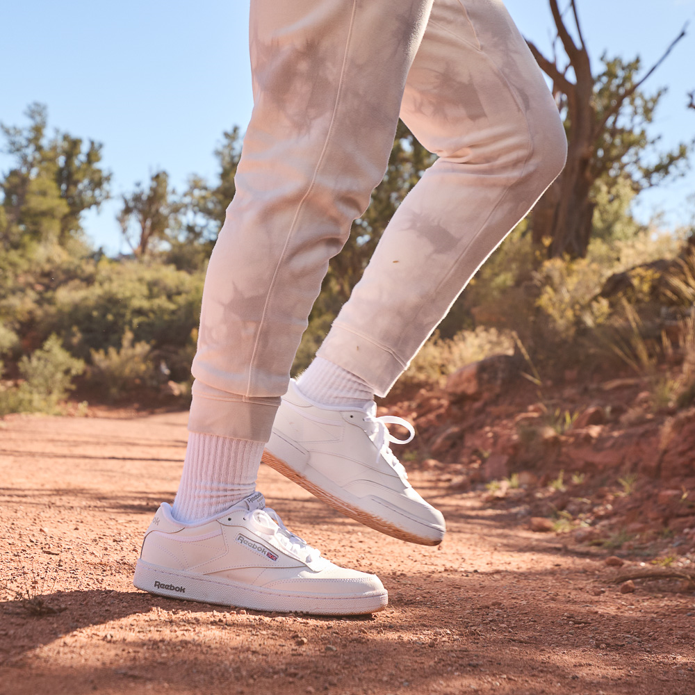 white and blue reebok classics