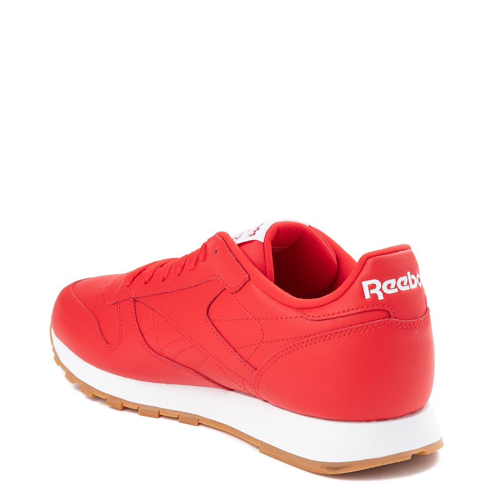 all red athletic shoes