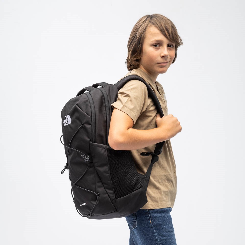 lifestyle jester north face backpack The Mid Grey Dark Heather/TNF Black and premium metallic hardware combine style The North Face Jester backpack