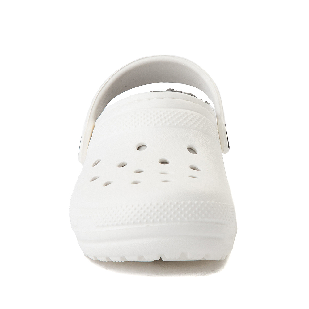white crocs with gray fuzz