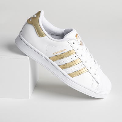 black adidas shoes with gold bottoms
